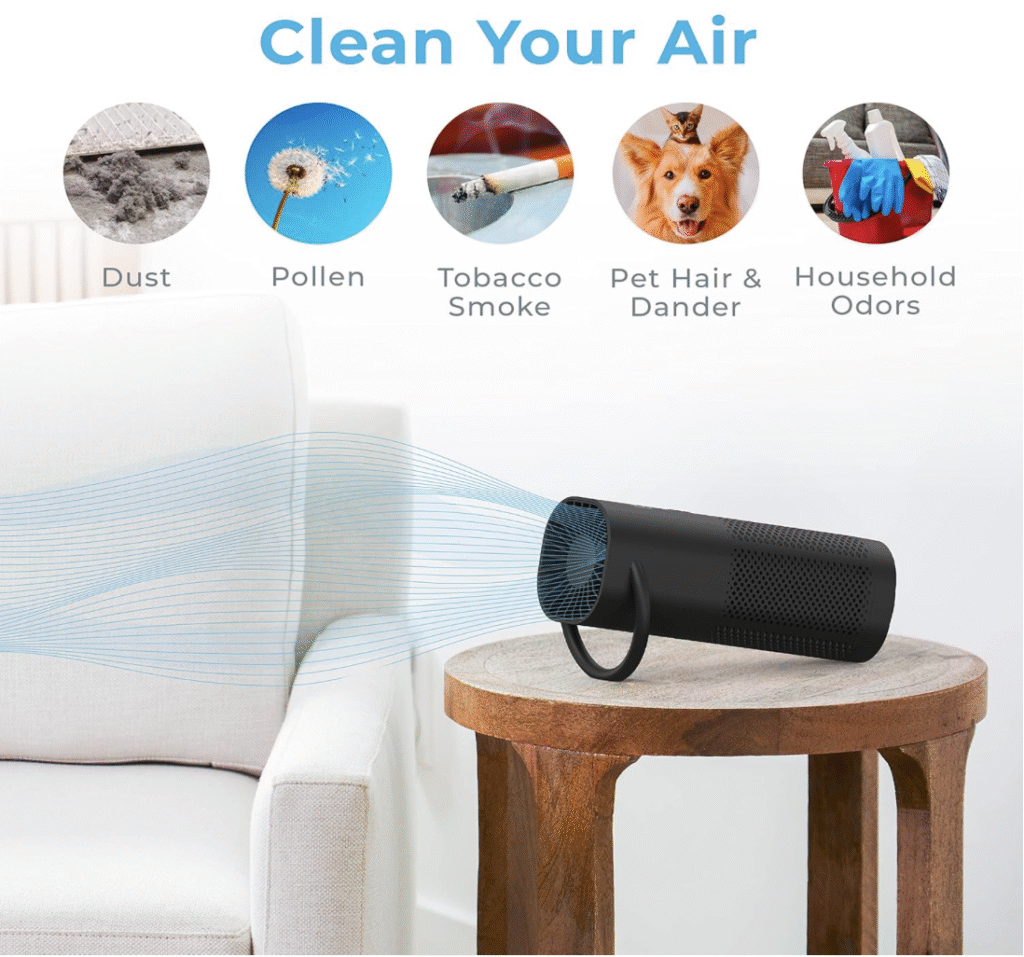 Portable air purifier by Pure Enrichment shown on a table, with icons depicting the pollutants it helps to eliminate: dust, pollen, tobacco smoke, pet hair, and household odors. Purifying air in a living space for improved health.