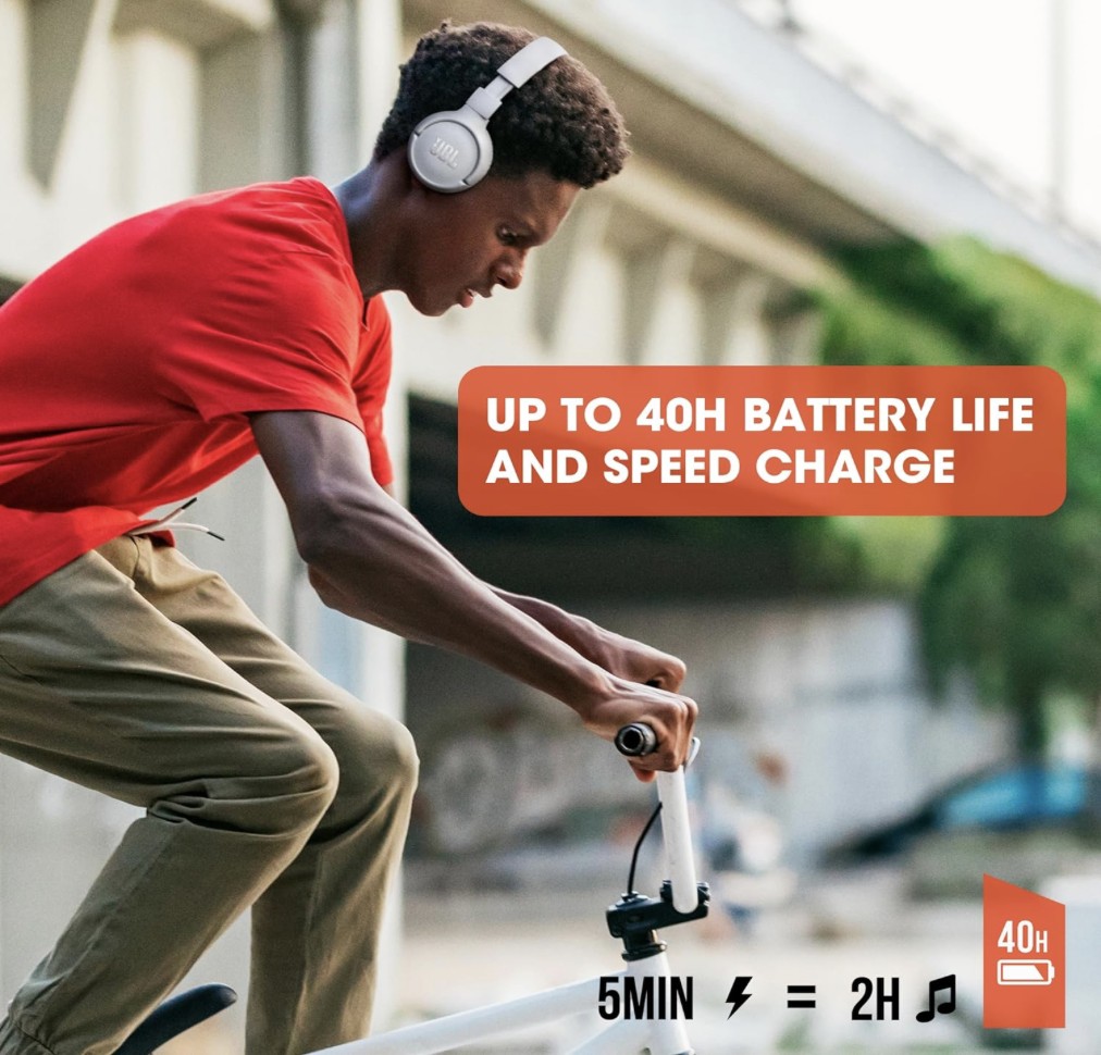 Man riding a bike wearing JBL Tune 510BT headphones with text showing 40-hour battery life and speed charge feature
