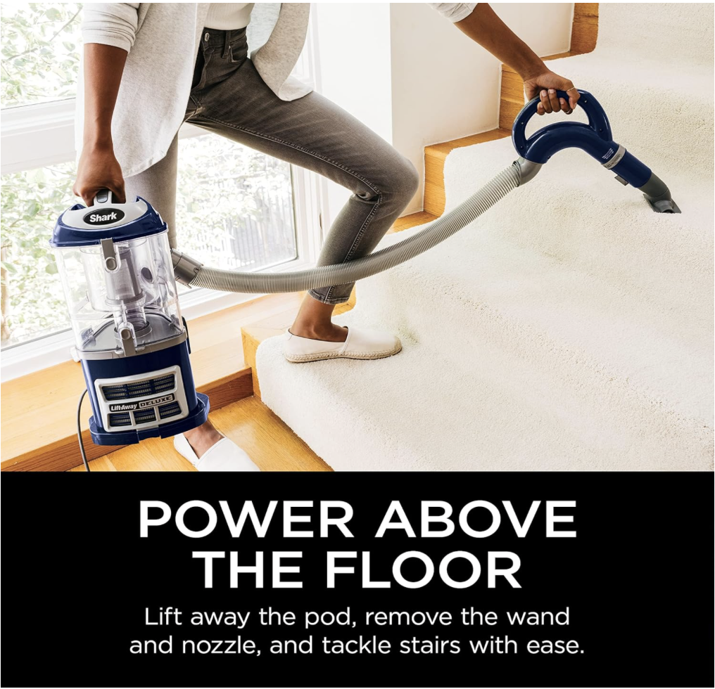 erson using the Shark NV360 lift-away pod to vacuum stairs with the wand and hose attachment for above-floor cleaning.