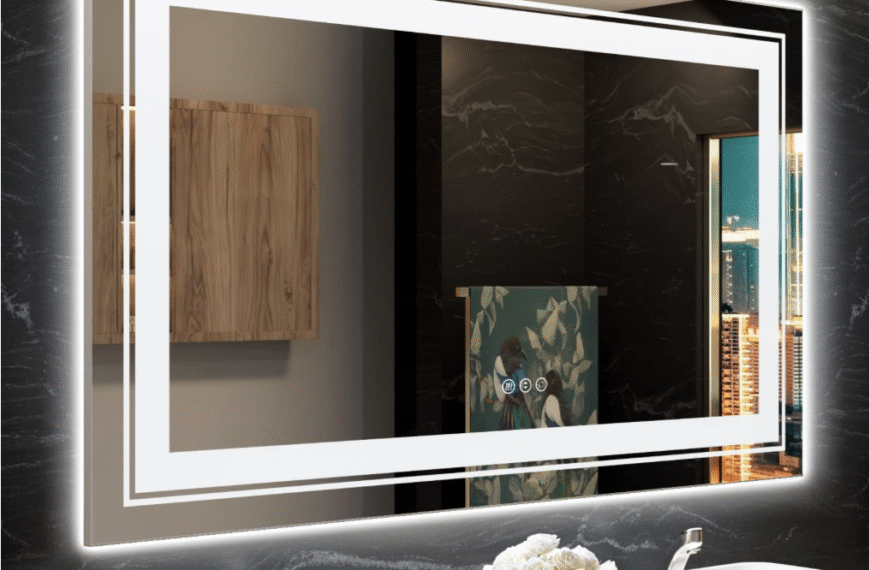 Snowdool LED bathroom mirror with modern backlit design above dual sinks in a sleek black-tile setting.
