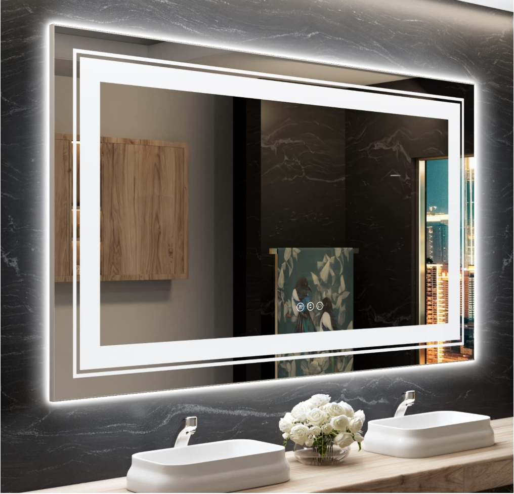 Snowdool LED bathroom mirror with modern backlit design above dual sinks in a sleek black-tile setting.