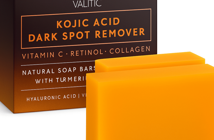 High-resolution image of VALITIC Kojic Acid Dark Spot Remover packaging with two bright orange soap bars, featuring product text highlighting Vitamin C, Retinol, Collagen, and Turmeric on a clean white background.