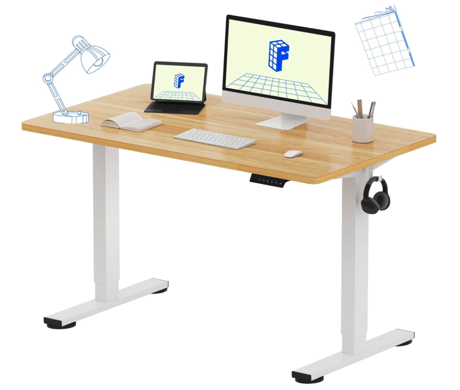 FLEXISPOT EN1 electric standing desk with white frame and maple desktop, shown with monitor, laptop, keyboard, and accessories