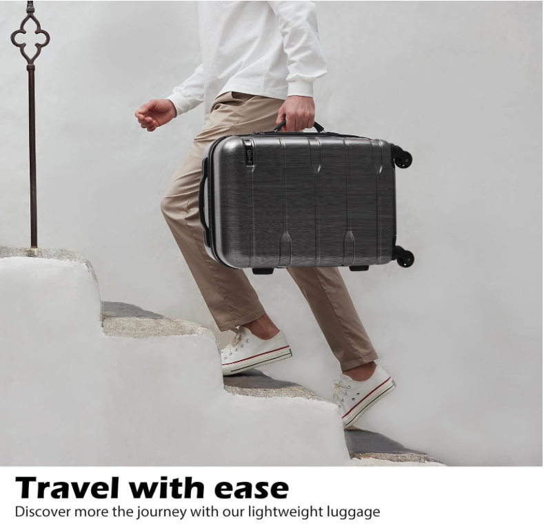 Coolife luggage 20-inch carry-on in charcoal, lightweight design being carried upstairs.