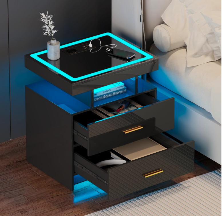 JDPAG LED Nightstand with glass top lighting, dual drawers, and wireless charging station beside bed.