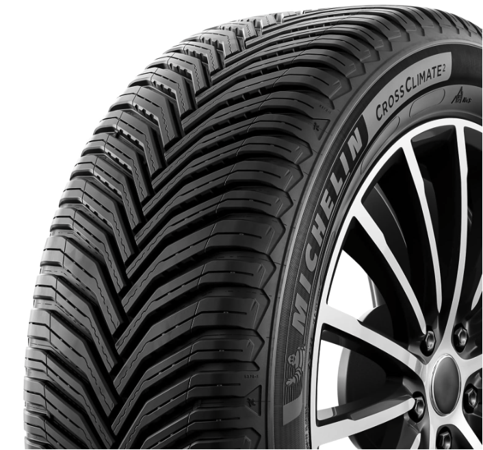 Close-up view of the MICHELIN CrossClimate2 tire showing its directional V-formation tread pattern and sidewall branding.